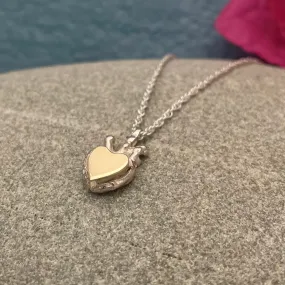 Silver Pendant with a 9k Gold Claddagh Heart